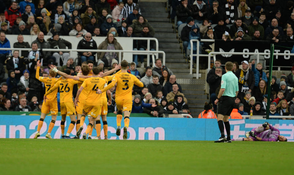 Cambridge players celebrate following Joe Ironside's opening goal during the Emirates FA Cup Third Round match against Newcastle United.