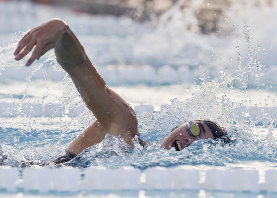 Nease's Olivia Moore competes in the 200-yard freestyle at the Class 3A championships.