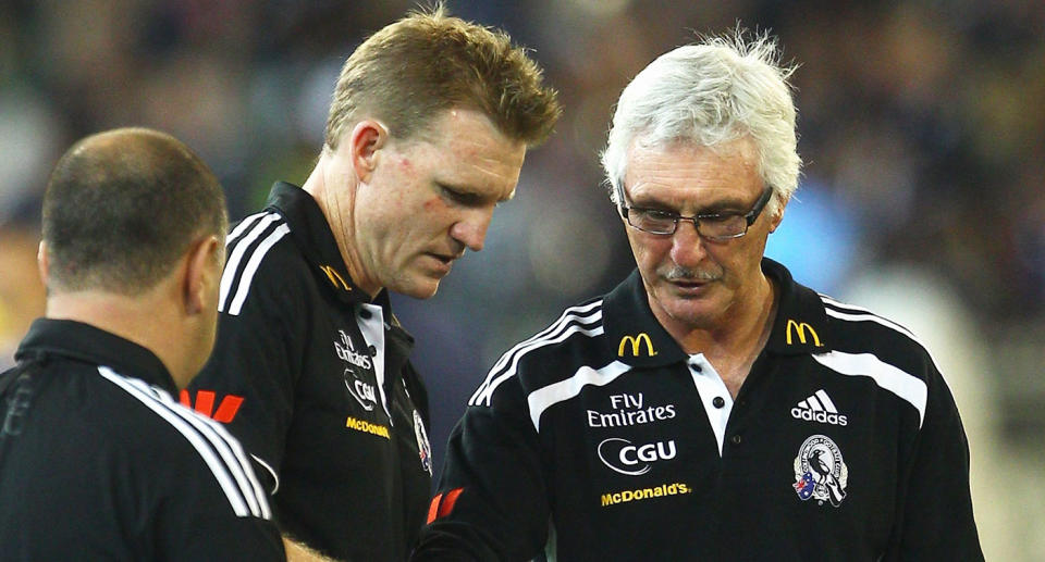 Nathan Buckley replaced Mick Malthouse as Collingwood coach after the 2011 AFL grand final as part of the club's succession plan. Pic: Getty 