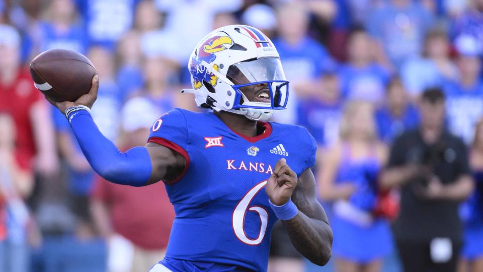 The Kansas offense, led by quarterback Jalon Daniels, was one of the most exciting in the conference last year. Can the Jayhawks keep the momentum going this season? (AP Photo/Reed Hoffmann)