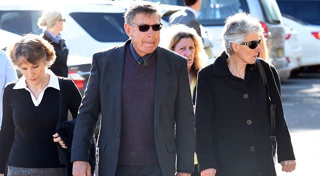 Mr Scott walks with his family after leaving Griffith Local Court. Photo: AAP