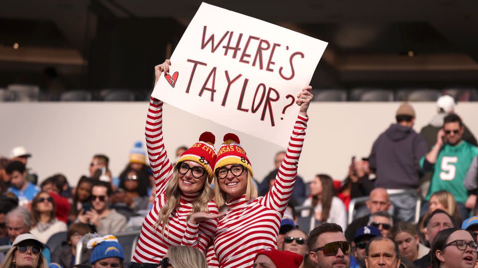 Fans hold a "Where's Taylor" sign during a game between the Kansas City Chiefs and Los Angeles Chargers at SoFi Stadium on January 07, 2024 in Inglewood, California. - Harry How/Getty Images