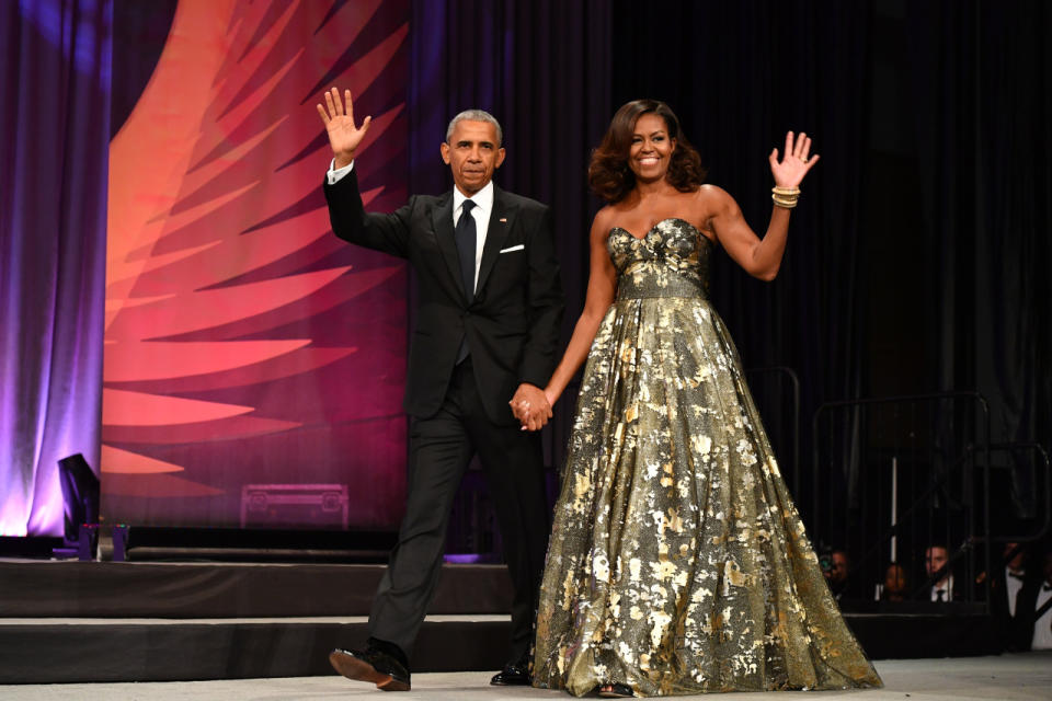 President Barack Obama and First Lady Michelle Obama in a strapless gown at the Congressional Black Caucus Foundation’s 46th Annual Legislative Conference Phoenix Awards Dinner in Washington, DC.