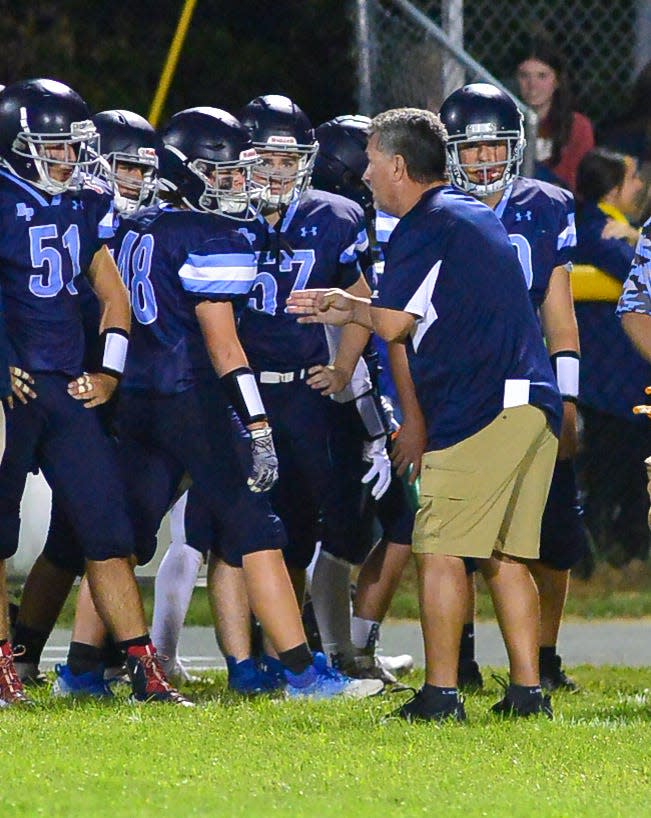 Bristol-Plymouth head coach John Parris talks with players during Friday’s game against Old Colony.