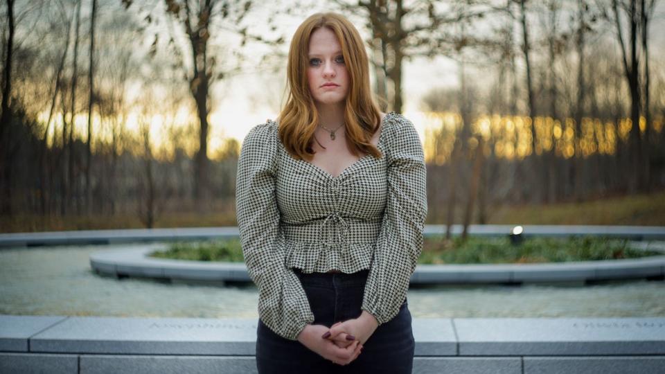 PHOTO: Jackie Hegarty, a survivor of the 2012 shooting at Sandy Hook Elementary School, visits the Sandy Hook Permanent Memorial in Newtown, Connecticut. (Adam Wolffbrandt/ABC News)