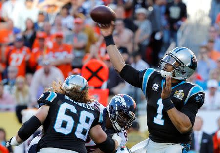 Carolina Panthers' quarterback Cam Newton throws a pass in the first quarter. REUTERS/Mike Blake