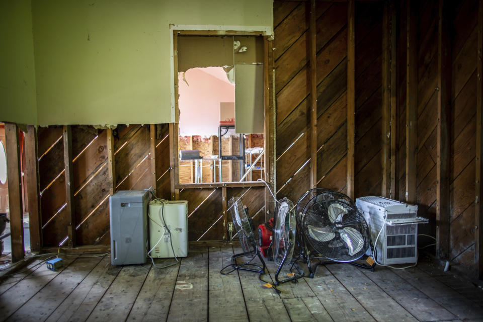 A view of the living room in the house of Ed Haggett that was damaged by 2023 flood in Montpelier, Vt., July 3, 2024. Haggett is waiting to hear whether the city or the Federal Emergency Management Agency will buy his home. A year after catastrophic flooding inundated parts of Vermont, some homeowners are still in the throes of recovery. (AP Photo/ Dmitry Belyakov)