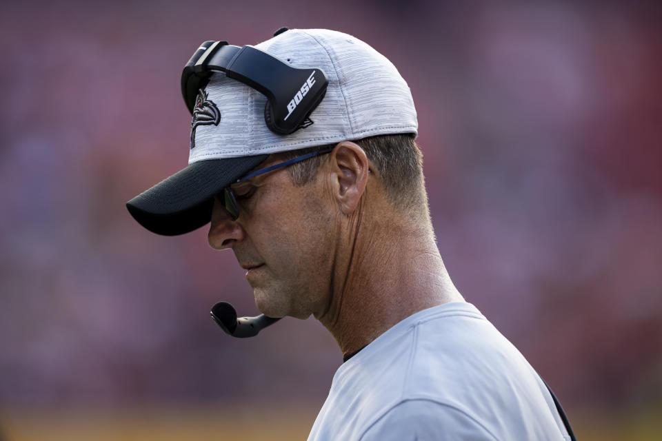 LANDOVER, MD - AUGUST 28: Head coach John Harbaugh of the Baltimore Ravens looks on against the Washington Football Team during the first half of the preseason game at FedExField on August 28, 2021 in Landover, Maryland. (Photo by Scott Taetsch/Getty Images)