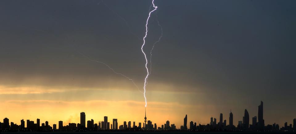 TOPSHOT – Lightning strikes the liberation tower in Kuwait City during a thunder storm on April 5, 2019. (Photo by Yasser Al-Zayyat / AFP)YASSER AL-ZAYYAT/AFP/Getty Images