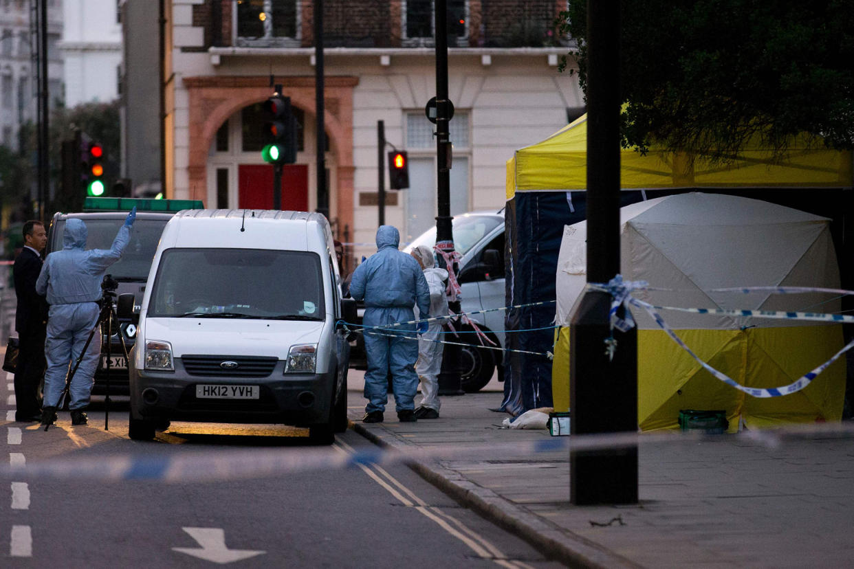 Forensic police at the scene after the teenager's knife rampage last year: Justin Tallis/AFP/Getty Images