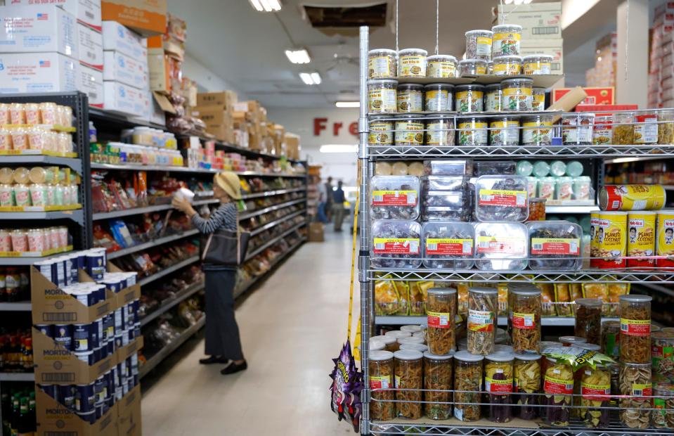 A shopper looks at items on Sept. 8 in Chinatown Supermarket store in Oklahoma City.