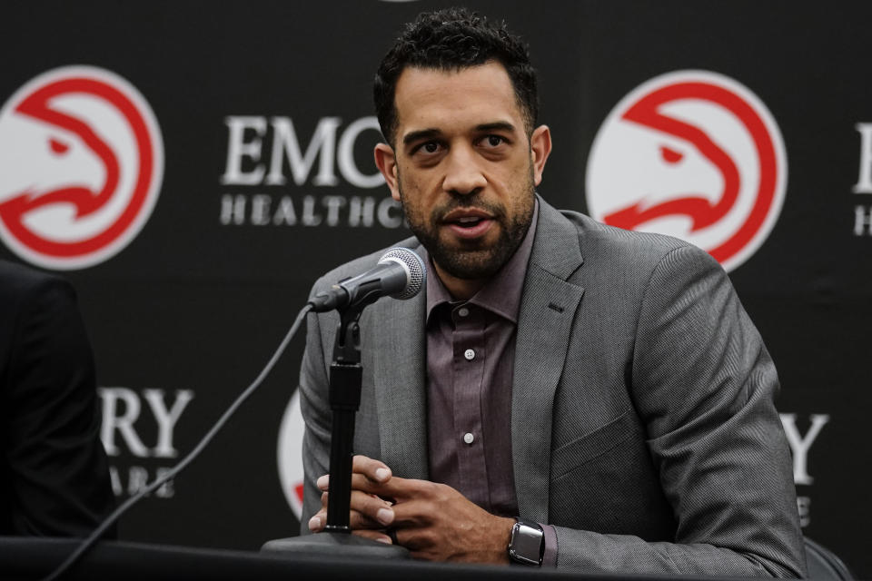 FILE - Atlanta Hawks general manager Landry Fields speaks during a news conference, Friday, July 1, 2022, in Atlanta. The Atlanta Hawks, allowing the most points per game in the NBA and struggling to remain above the cutoff line for the play-in tournament, surprised many by not making a move before Thursday's trade deadline. General manager Landry Fields said Friday, Feb. 9, 2024, no offer, including any much-speculated deal involving shooting guard Dejounte Murray, fit the team's long-term goals. (AP Photo/John Bazemore, File)