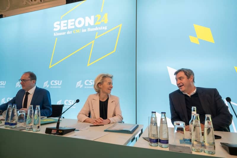 European Commission President Ursula von der Leyen (C), Minister President of Bavaria and Christian Social Union in Bavaria (CSU) Chairman Markus Soeder (R) and CSU Regional Group Leader Alexander Dobrindt take part in the CSU's winter retreat in the Bundestag at Seeon Monastery. Peter Kneffel/dpa