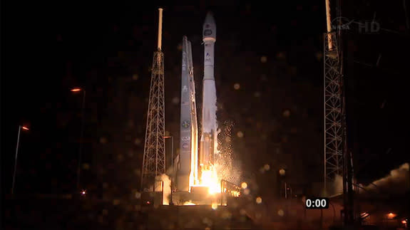 An Atlas 5 rocket carrying NASA's TDRS-K next-generation satellite launches from a pad at Cape Canaveral Air Force Station in Florida at 8:48 p.m. ET on Jan. 30, 2013.