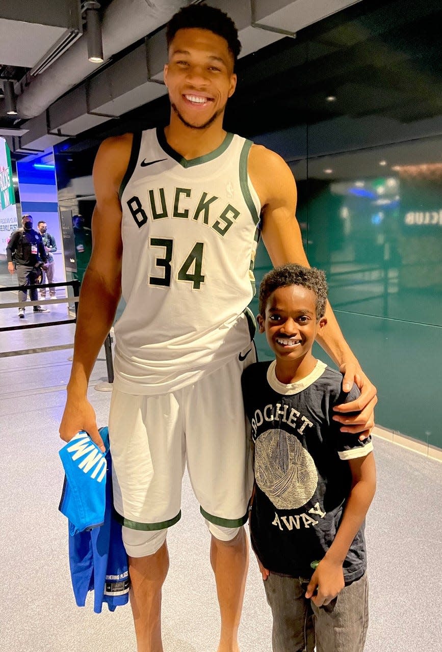 Giannis Antetokounmpo and Jonah Larson in spring of 2021 at Fiserv Forum.