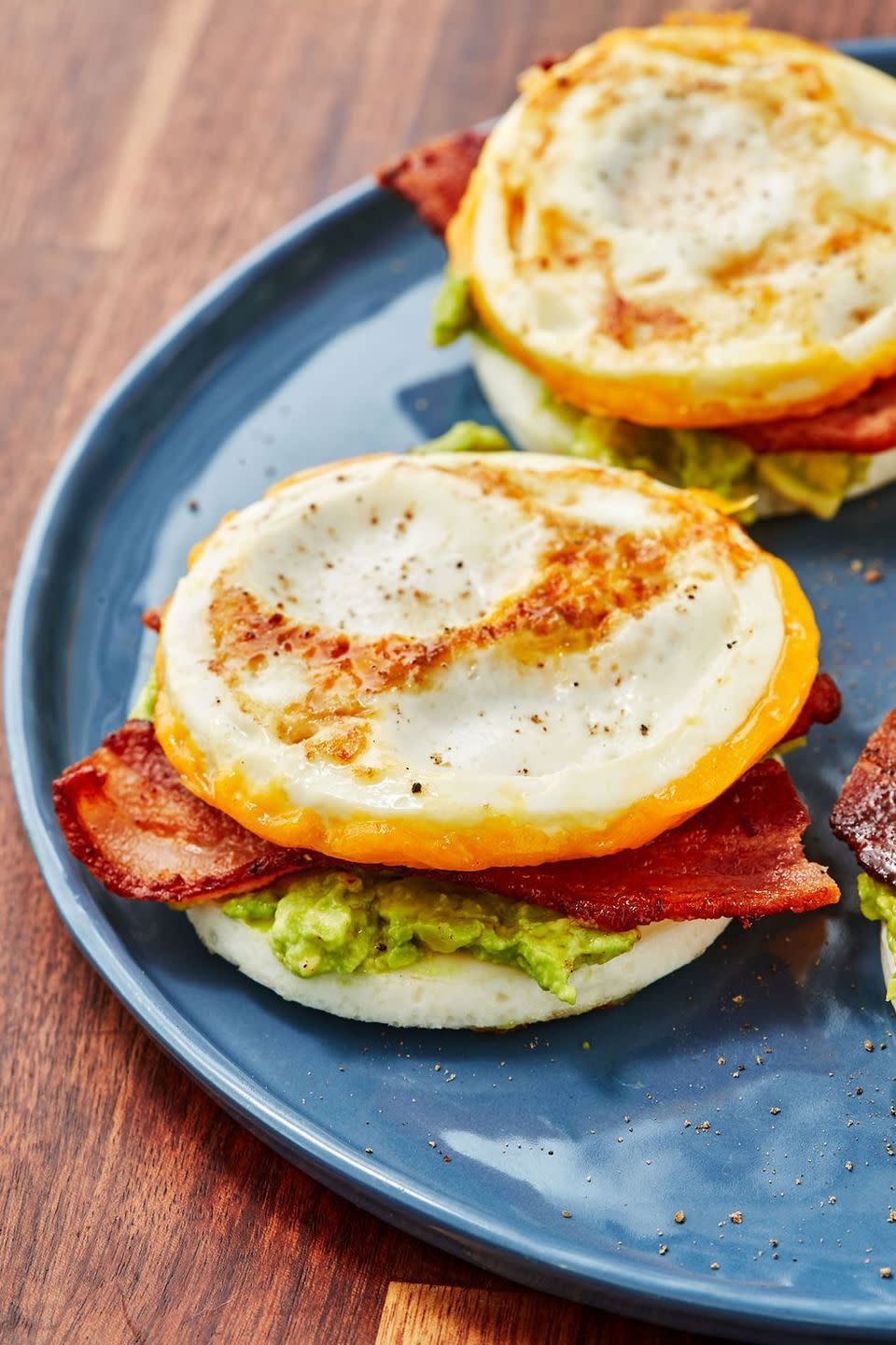 <p>Using the egg for the bun on this classic <a href="https://www.delish.com/uk/cooking/recipes/g30312476/low-carb-breakfast-recipes/" rel="nofollow noopener" target="_blank" data-ylk="slk:breakfast;elm:context_link;itc:0;sec:content-canvas" class="link ">breakfast</a> sandwich is a true genius move. We loaded ours up with bacon, cheddar, and avocado but go for some of your favourite fillings! Sausage and gruyère would be killer too!</p><p>Get the <a href="https://www.delish.com/uk/cooking/recipes/a30805681/bunless-bacon-egg-and-cheese-recipe/" rel="nofollow noopener" target="_blank" data-ylk="slk:Bunless Bacon, Egg And Cheese;elm:context_link;itc:0;sec:content-canvas" class="link ">Bunless Bacon, Egg And Cheese</a> recipe.</p>