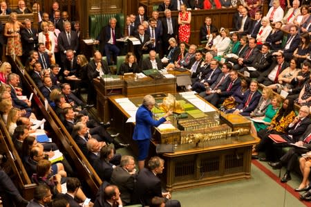 Theresa May speaks on her last day in office as Britain's Prime Minister, at the House of Commons in London