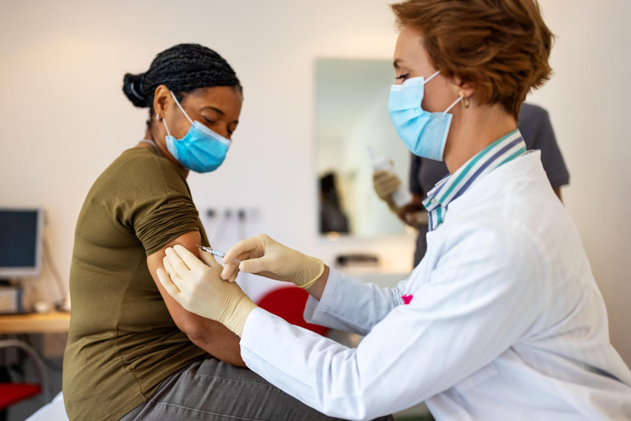 A woman receives the COVID-19 vaccine. (Getty Images)