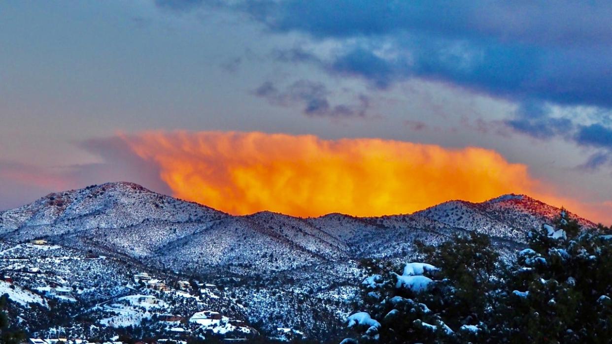 <div>Wow! Karen Shaw captured a fiery-looking cloud over the Black Hills in Prescott, Arizona</div>