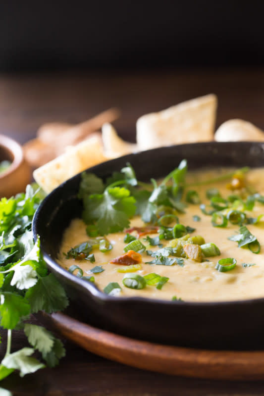 <p>Lovely Little Kitchen</p><p>This hatch green chile queso is super quick and easy to make and comes out smooth and creamy, even without boxed cheese.</p><p><strong>Get the recipe: <a href="https://lovelylittlekitchen.com/hatch-green-chile-queso/" rel="nofollow noopener" target="_blank" data-ylk="slk:Hatch Green Chile Queso;elm:context_link;itc:0;sec:content-canvas" class="link rapid-noclick-resp">Hatch Green Chile Queso</a></strong></p>