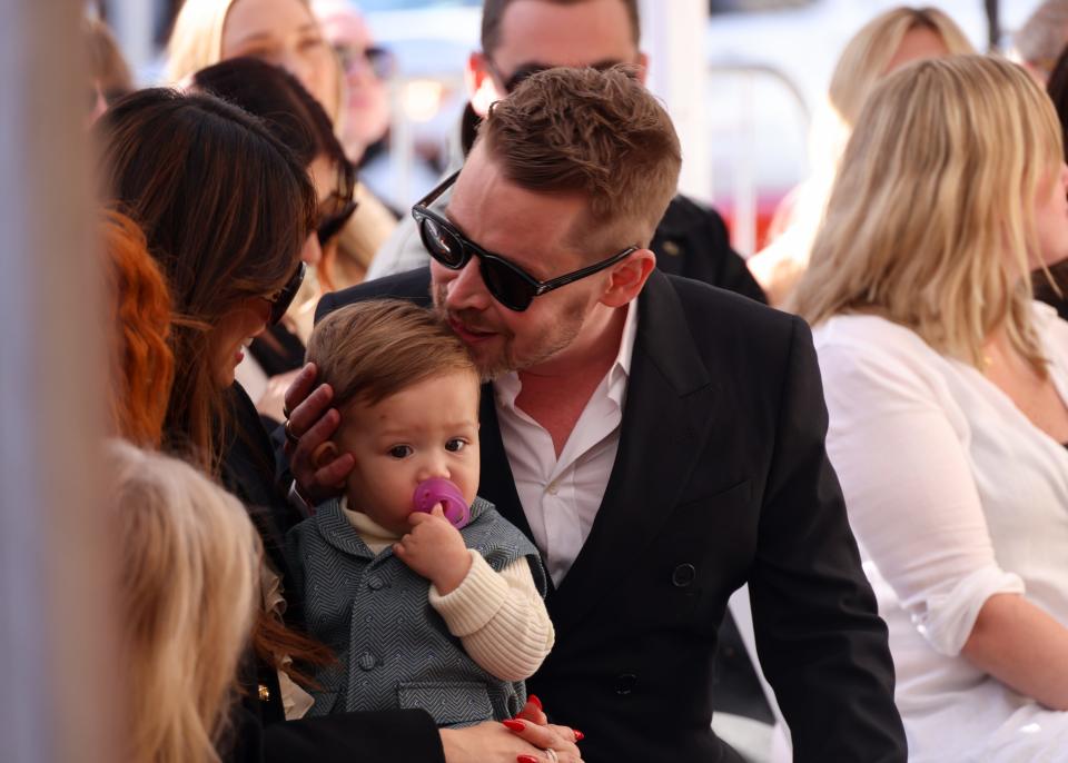 Macaulay Culkin and his youngest son at the Hollywood Walk of Fame on December 1, 2023.