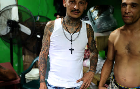 Prisoner Ramon Bladimir Funes who is a member of Barrio-18 poses for a photograph in Puerto Cortes jail, Honduras, July 31, 2018. REUTERS/Goran Tomasevic