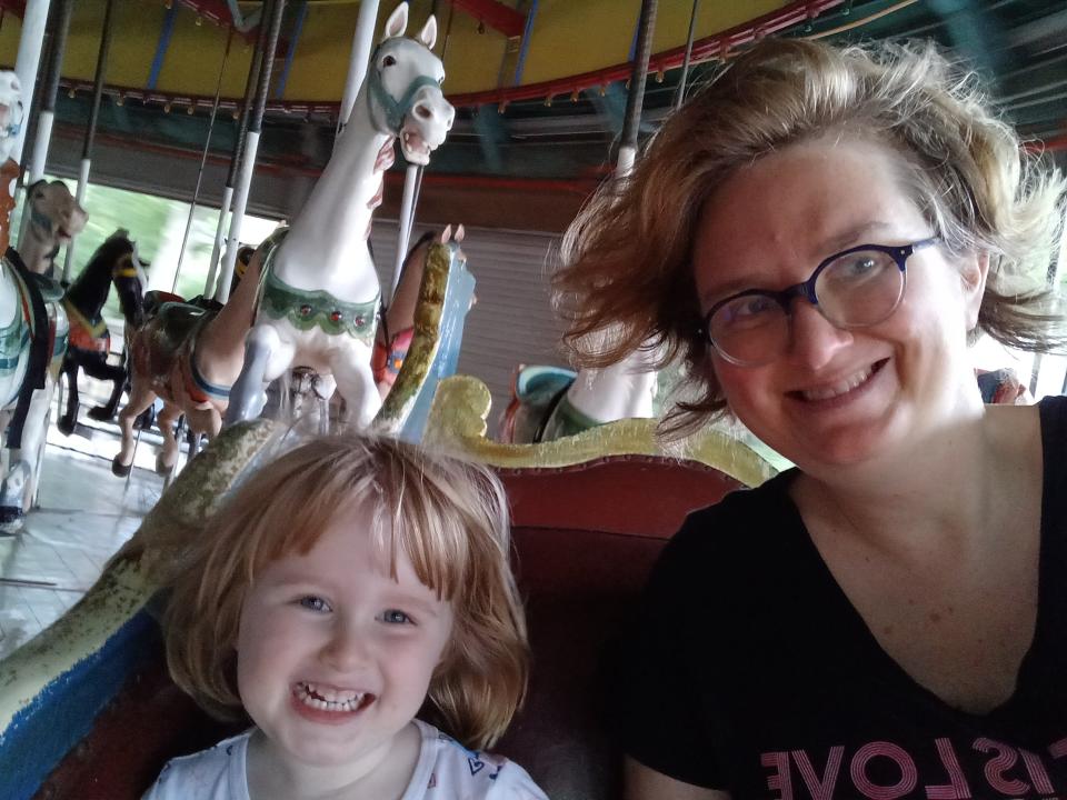 Mom and child at Carrousel in New York City.