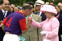 <p>After playing a polo match in Windsor, Charles gave his mother a chivalrous kiss on the hand.</p>