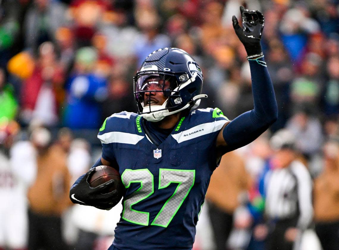 Seattle Seahawks cornerback Riq Woolen (27) reacts to fumble recovery against the Washington Commanders during the third quarter of the game at Lumen Field, on Sunday, Nov. 12, 2023, in Seattle, Wash.