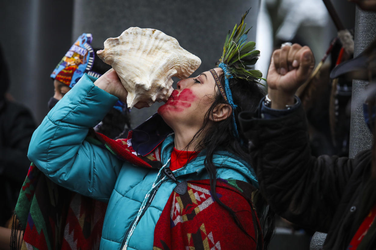 A scene from the National Day of Mourning in Plymouth, Mass., a reminder of the genocide of millions of Native people and the theft of Native lands. (Photo: Erin Clark/The Boston Globe via Getty Images)