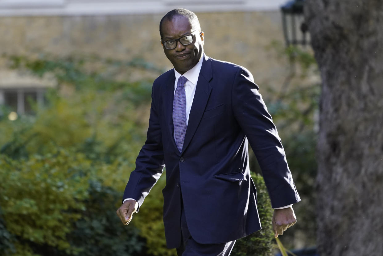 FILE - Britain's Chancellor of the Exchequer Kwasi Kwarteng arrives in Downing Street in London, Wednesday, Sept. 7, 2022 for the first cabinet meeting since Liz Truss was installed as British Prime Minister a day earlier. British media say Treasury chief Kwasi Kwarteng has left the government, ahead of an announcement by Prime Minister Liz Truss on changes to an economic package that sparked market turmoil. (AP Photo/Alberto Pezzali, File)
