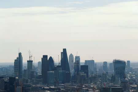 FILE PHOTO: A view of the City of London and Canary Wharf. July 7, 2017. REUTERS/John Sibley/File Photo