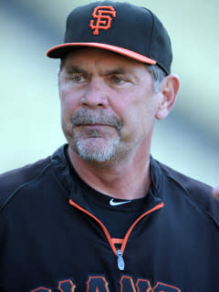 Giants manager Bruce Bochy prepares for Tuesday's game against the Dodgers. San Francisco managed just six hits in a 2-1 loss