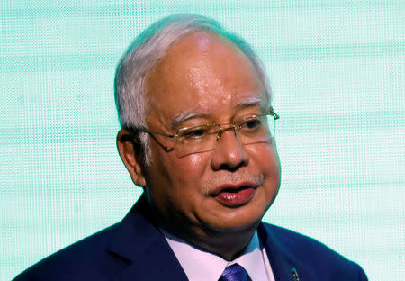 Malaysian Prime Minister Najib Razak addresses business leaders during a business forum, ahead of the Association of Southeast Asian Nations (ASEAN) summit in Manila, Philippines April 28, 2017. REUTERS/Erik De Castro