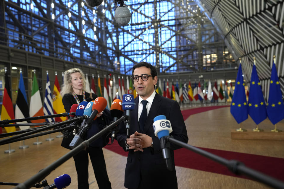 French Foreign Minister Stephane Sejourne speaks with the media as he arrives for a meeting of EU foreign ministers at the European Council building in Brussels, Monday, Jan. 22, 2024. European Union Foreign Affairs Ministers meet in Brussels on Monday to discuss the situation in the Middle East and in Ukraine. (AP Photo/Virginia Mayo)