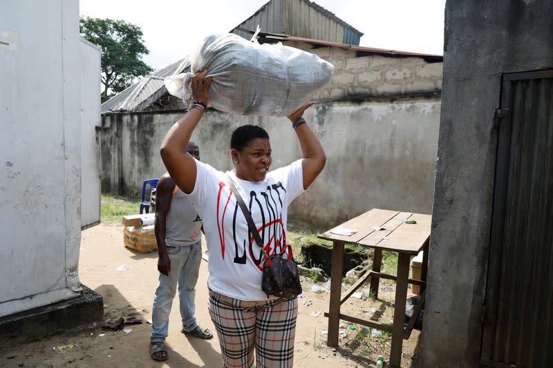 The Wider Image: Nigeria's female bouncers show their strength fighting stereotypes