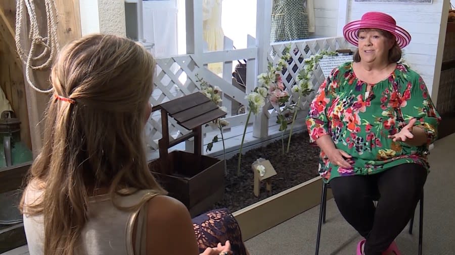 Cheryl Waites, known as 'the Hollyhock lady," recounts the rich history of Boulder City and the Hollyhocks. (KLAS)