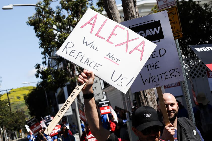 Culver City, CA - May 02: Writers Guild of America members walk the picket line on the first day of their strike in front of Amazon studios on Tuesday, May 2, 2023, in Culver City, CA. (Jay L. Clendenin / Los Angeles Times)