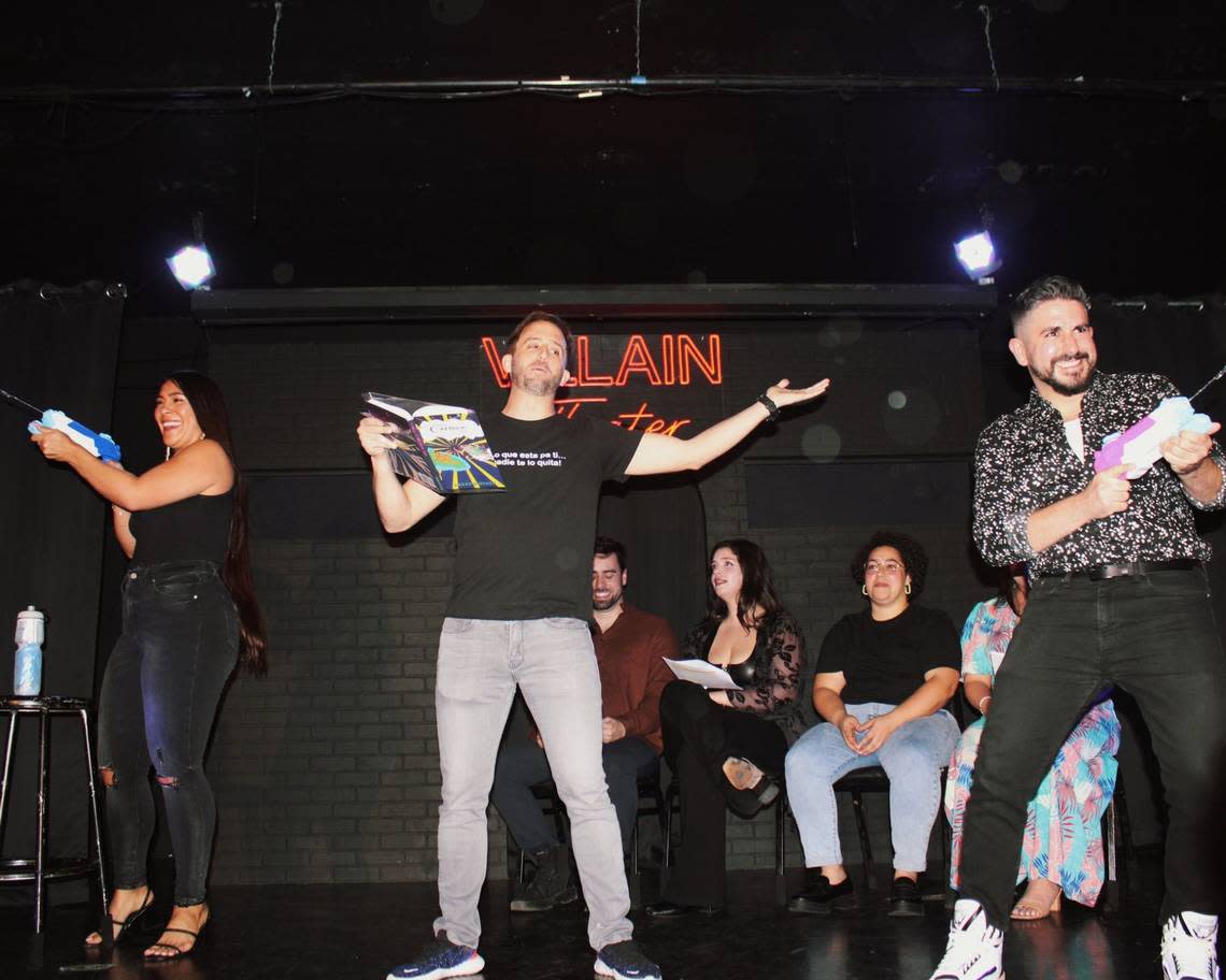 Miami author Andrew Otazo reads about the sun and moon during the launch party for his satirical book ‘The Miami Creation Myth’ at Villain Theater. Courtesy of Andrew Otazo