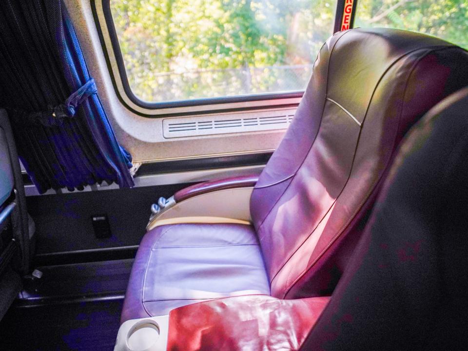 Seat in a business-class Amtrak car