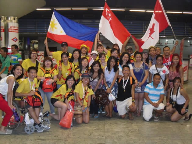 The Singapore contingent poses for a picture with pilgrims from the Philippines and Canada. (Photo courtesy of Michelle Goh)