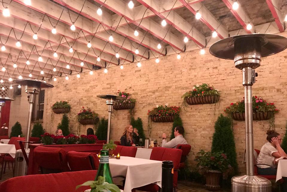 La Terrazza, the patio at Ristorante Bartolotta in Wauwatosa, has three walls keeping it cozy but is open at the front and overhead to supply fresh air.