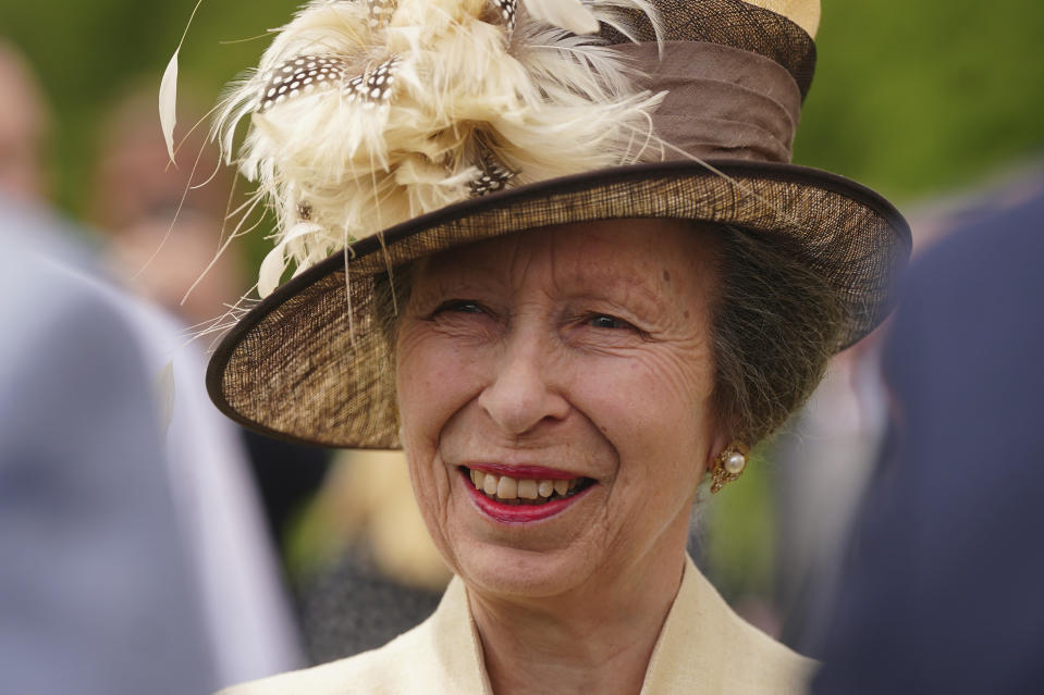 FILER - Britain's Princess Anne attends the Not Forgotten Association Annual Garden Party at Buckingham Palace in London, Friday May 17, 2024. Buckingham Palace says Princess Anne has sustained minor injuries and concussion following an incident on the Gatcombe Park estate on Sunday, June 23, 2024. The 73-year-old sister of King Charles III has been hospitalized as a precautionary measure for observation and is expected to make a full recovery. (Victoria Jones/Pool Photo via AP, File)
