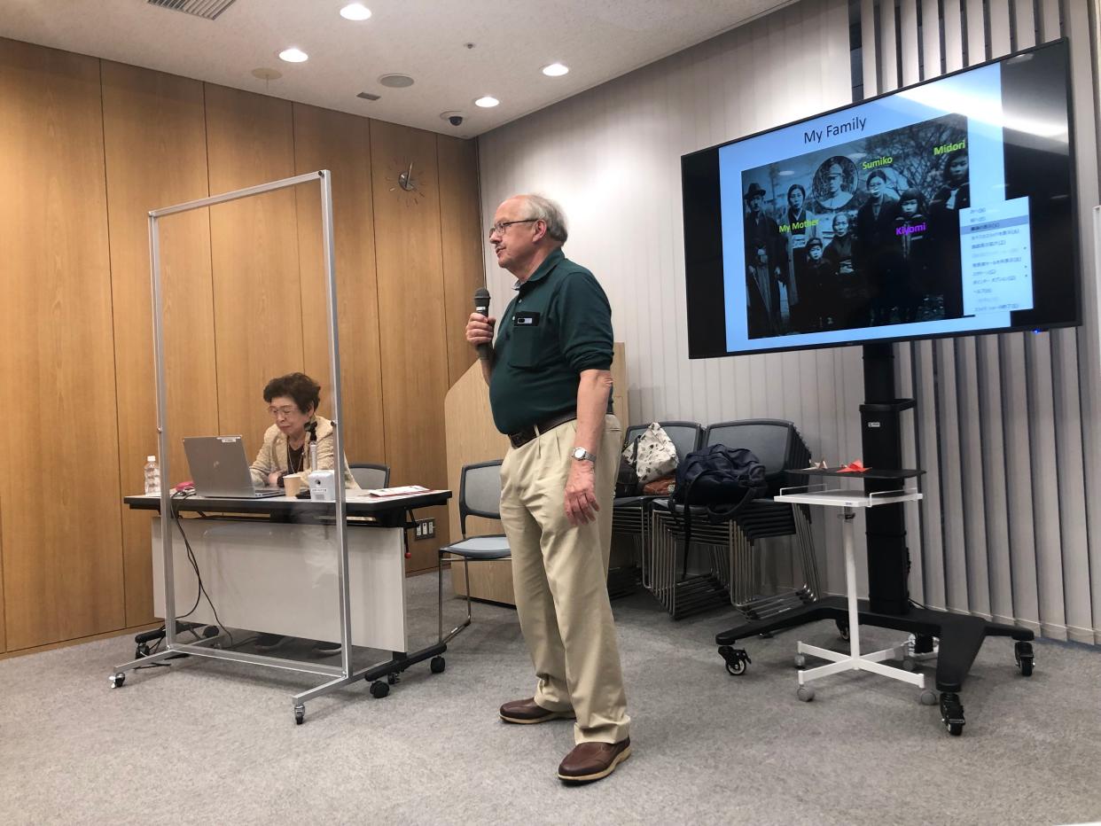 Kikyomi Kouno, seated at left, with translator John Hundleby, gives a talk about her life and the path she and her mother took in August 1945 after an atomic bomb struck Hiroshima, Japan. Kikyomi's sisters survived the attack, but died at a young age of cancer that likely can be attributed to the atomic bomb.