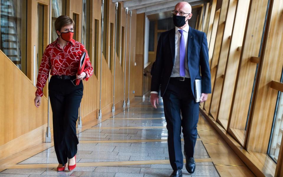 First Minister of Scotland and SNP leader Nicola Sturgeon and Deputy First Minister John Swinney -  Andy Buchanan/PA