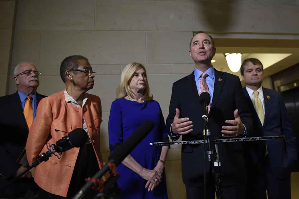 House Intelligence Committee Chairman Adam Schiff, D-Calif., second from right, talks with reporters on Capitol Hill in Washington, Wednesday, Nov. 6, 2019, about the House impeachment inquiry. He is joined by, from left, Rep. Gerry Connolly, R-Va., Del. Elinor Holmes Norton, D—D.C., Rep Carolyn Maloney, D-N.Y., and Rep. Mike Quigley, D-Ill.(AP Photo/Susan Walsh)