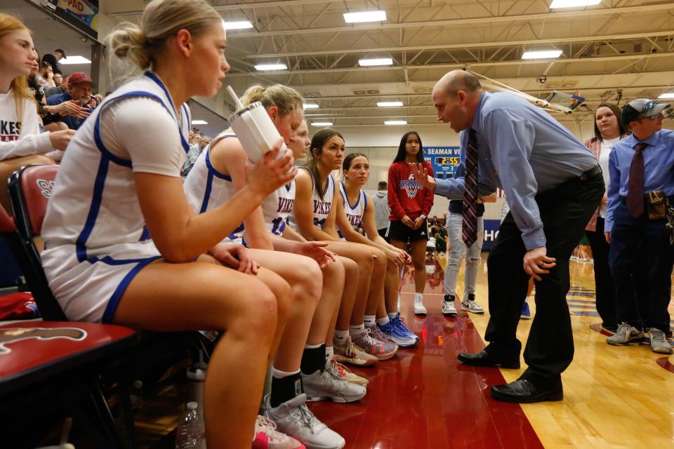 Seaman coach Matt Tinsely lays out the play for the final minutes of the third quarter against Basehor-Linwood during the Class 5A Sub-State Championship game at Seaman High School March 2, 2024.