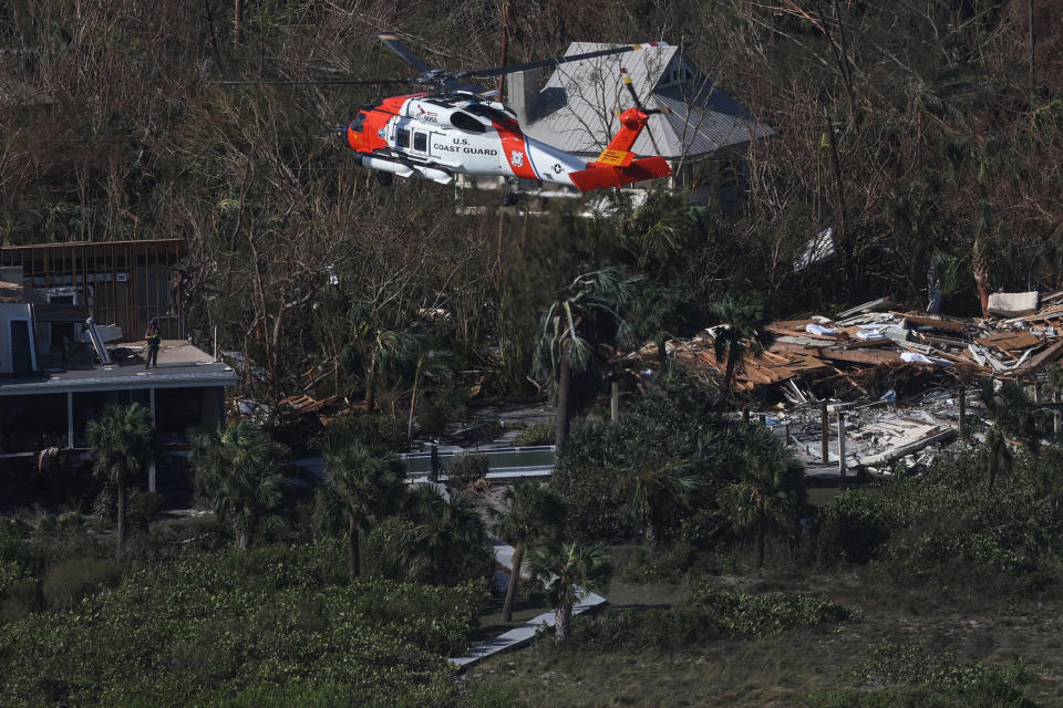 A Coast Guard helicopter on a rescue mission on Sanibel Island, Fla., on Thursday.