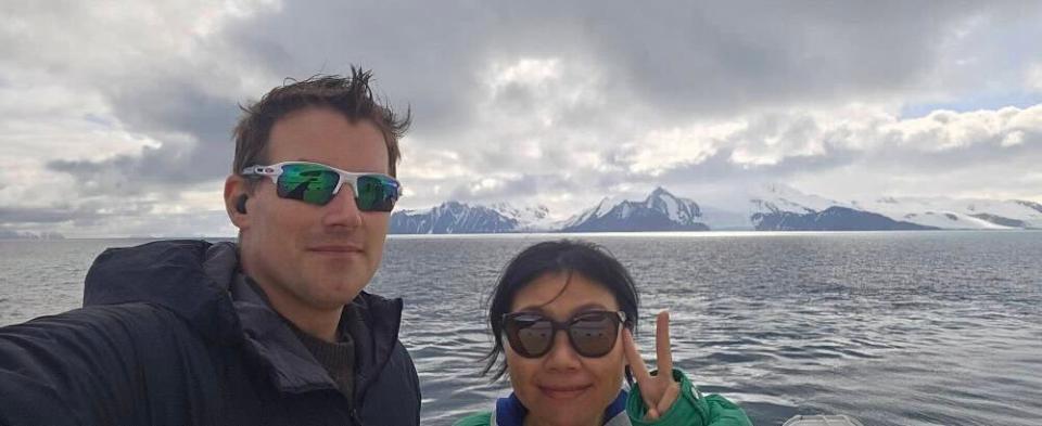 Joshua Terry and his fiancée Ian Ra on the deck of the Serenade of the Seas as it sailed through Antartica