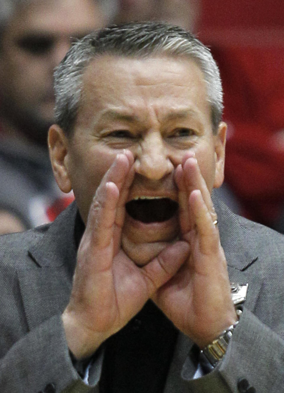 Cal Poly head coach Joe Callero yells to his players in the first half of a first-round game against Texas Southern in the NCAA college basketball tournament on Wednesday, March 19, 2014, in Dayton, Ohio. (AP Photo/Skip Peterson)